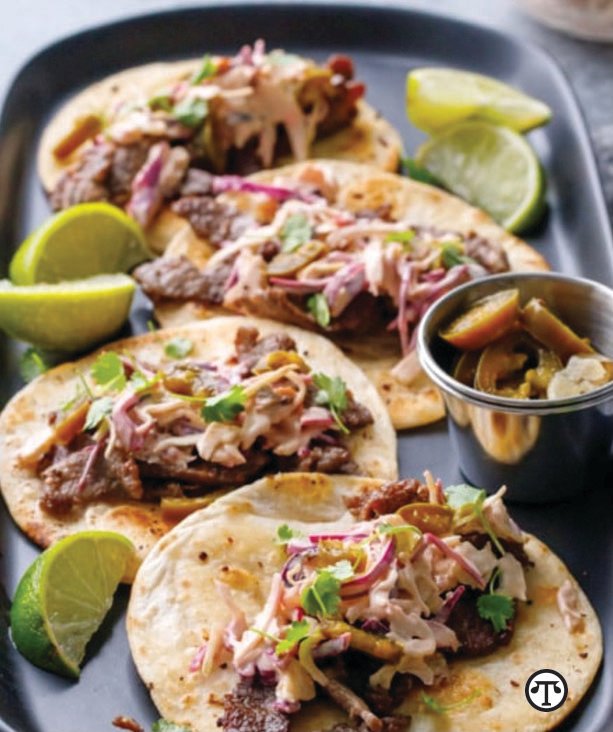 Heart-healthy* Mazola® helps make delicious steak tacos.